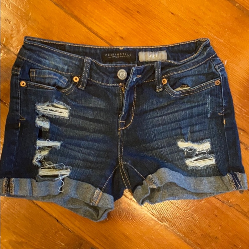 Dark wash distressed jean shorts